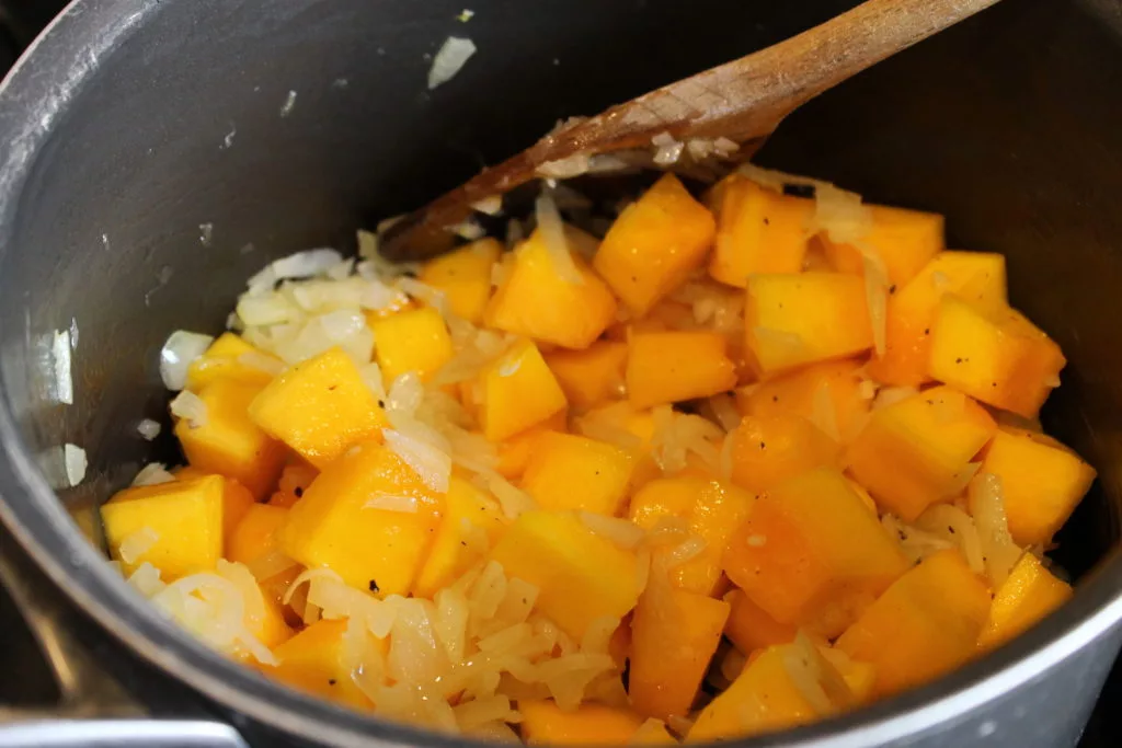 frying pumpkin and onions