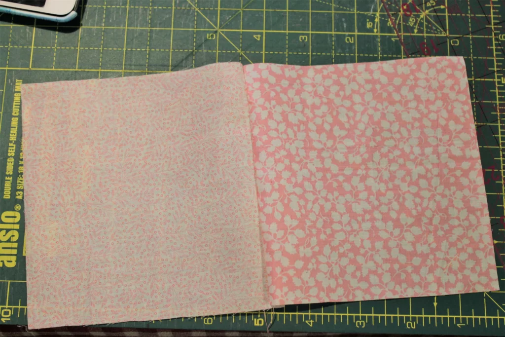 two pink quilt squares sewn together