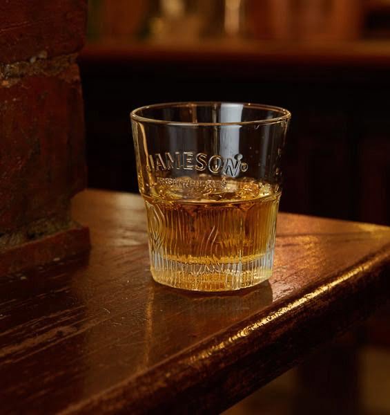 jameson irish whiskey in glass cup