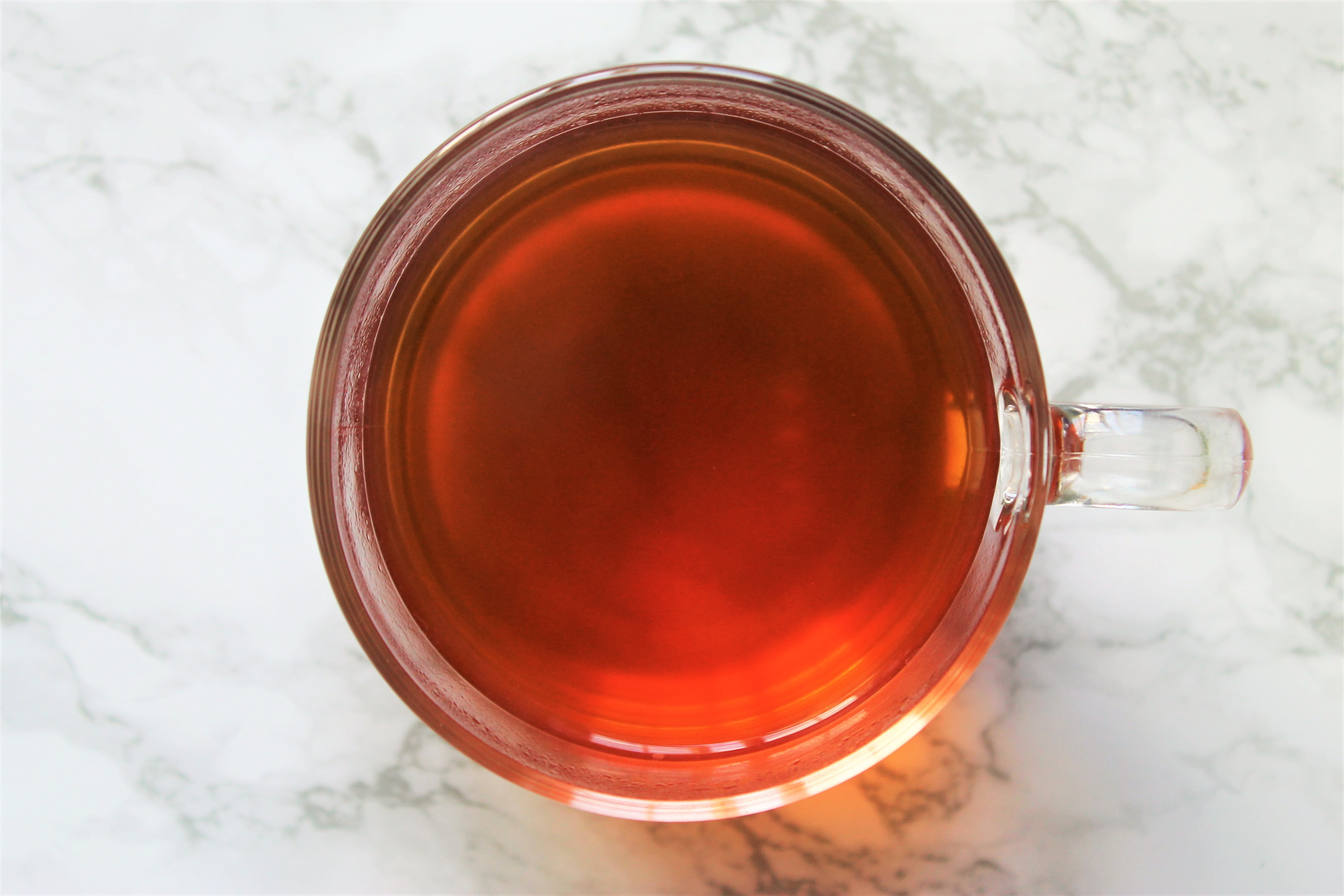 rooibos vanilla tea in glass teacup