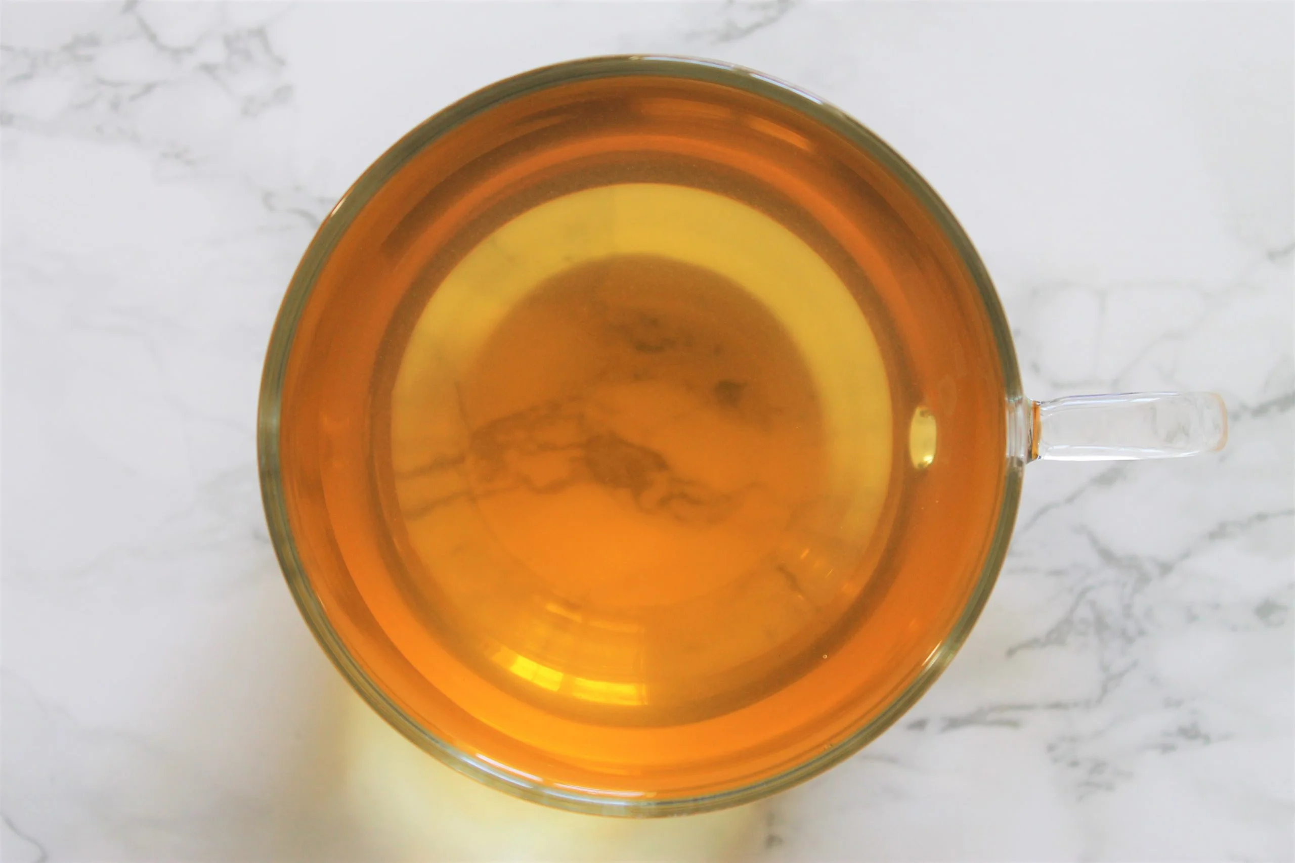 green tea in glass teacup