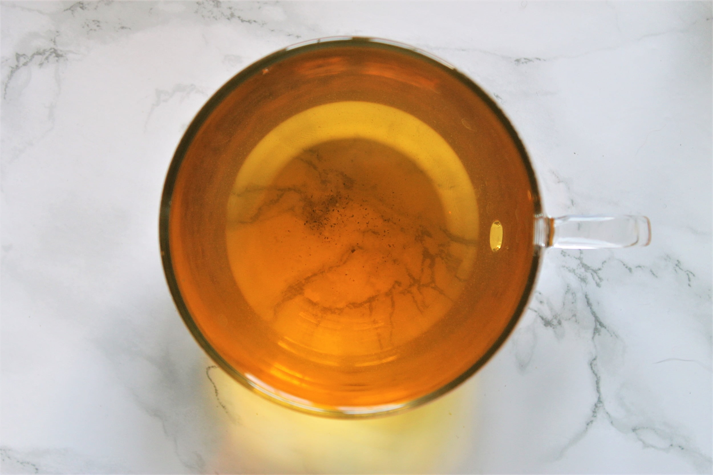 green tea with lemon glass teacup