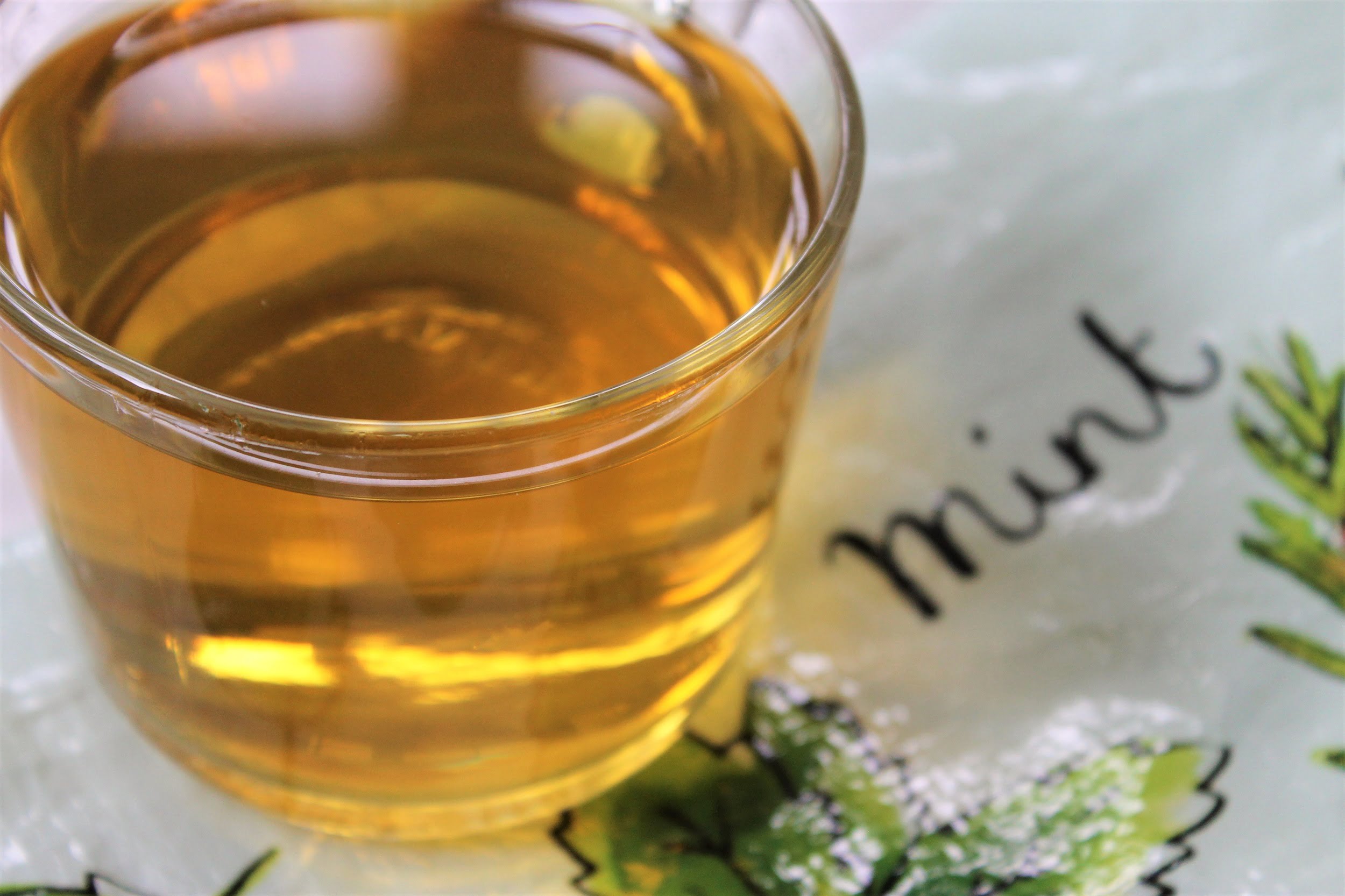 bion spearmint tisane in glass teacup