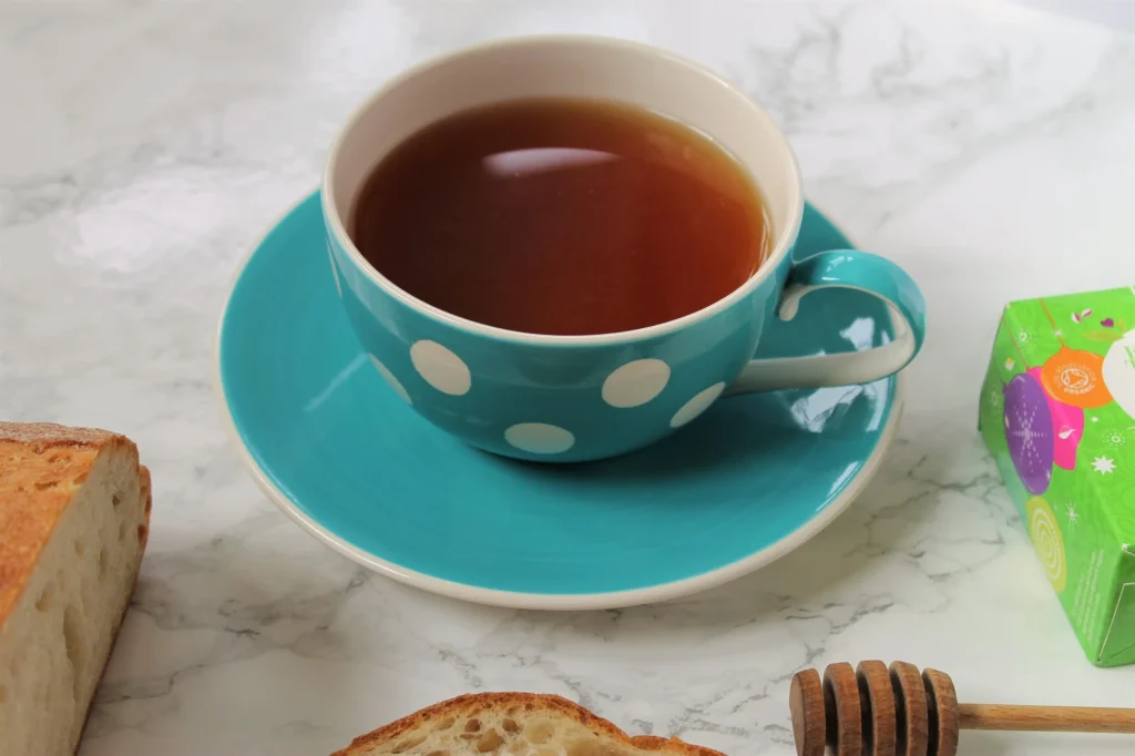 black spiced tea in spotty teacup