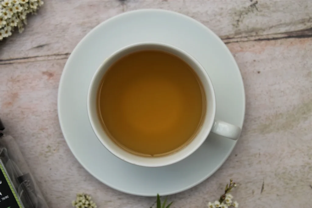 green tea with jasmine in white teacup