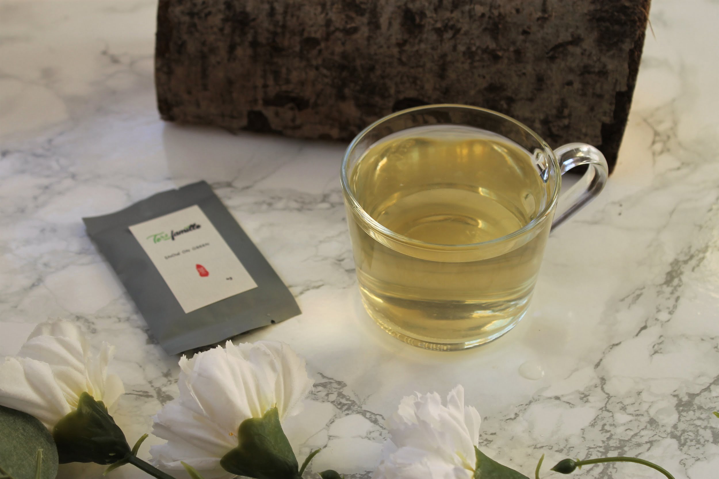 snow on green jasmine green tea