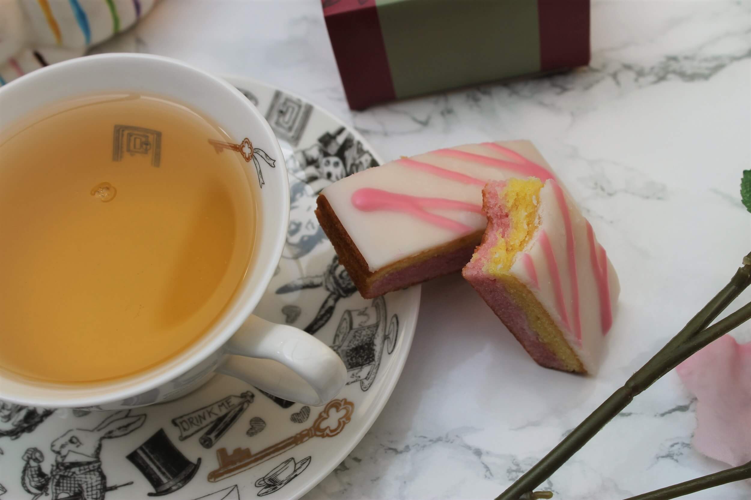 tea in a tea cup with angel cake slices