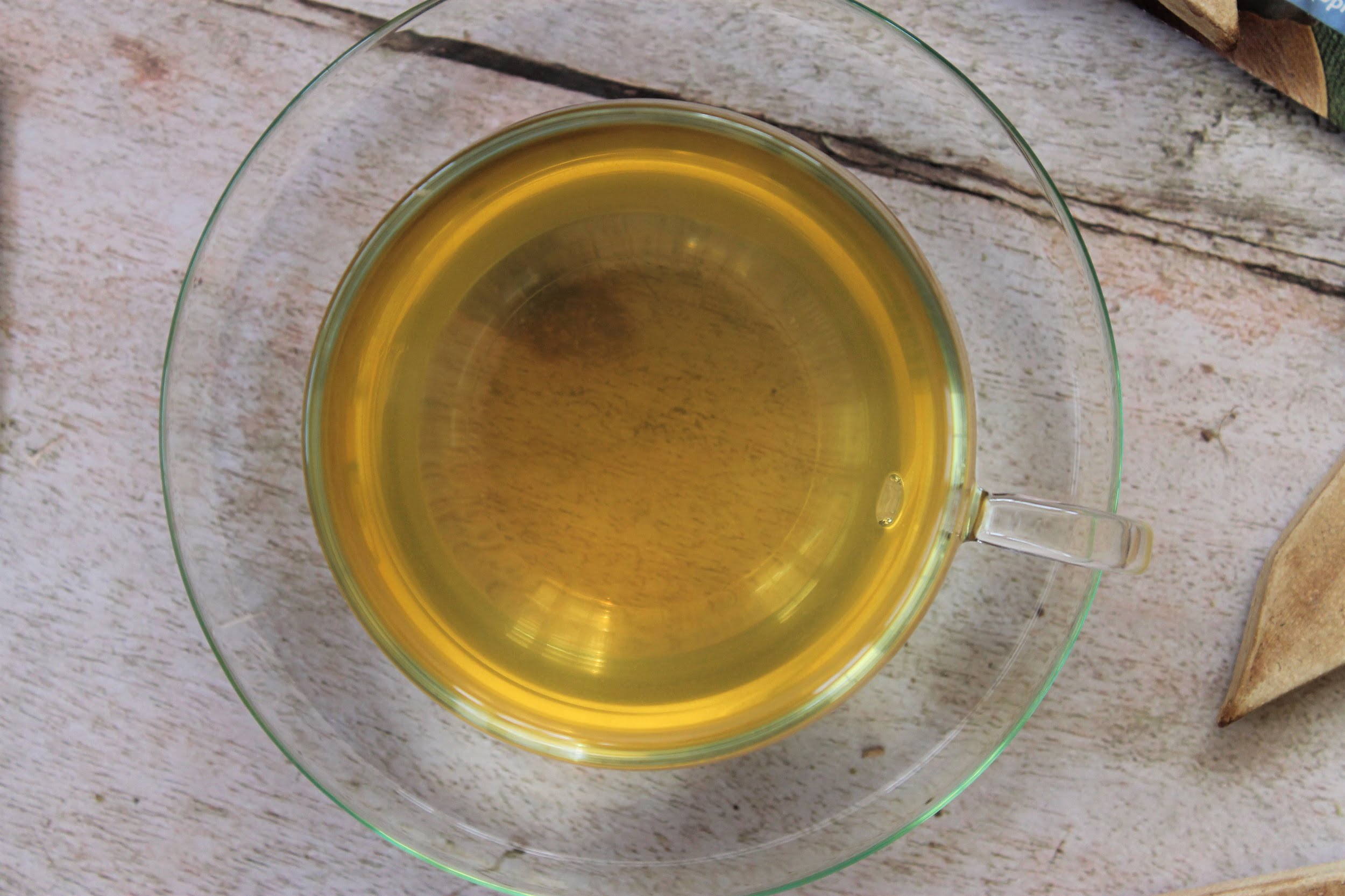 sweet green tea in glass teacup