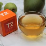 t2 fruitalicious surrounded by tropical fruit