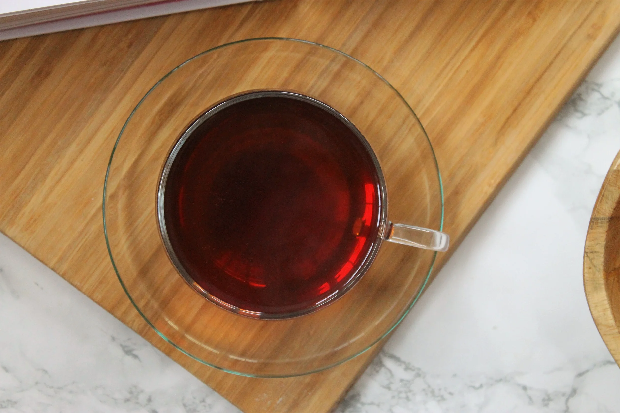 basilur black tea in a glass teacup