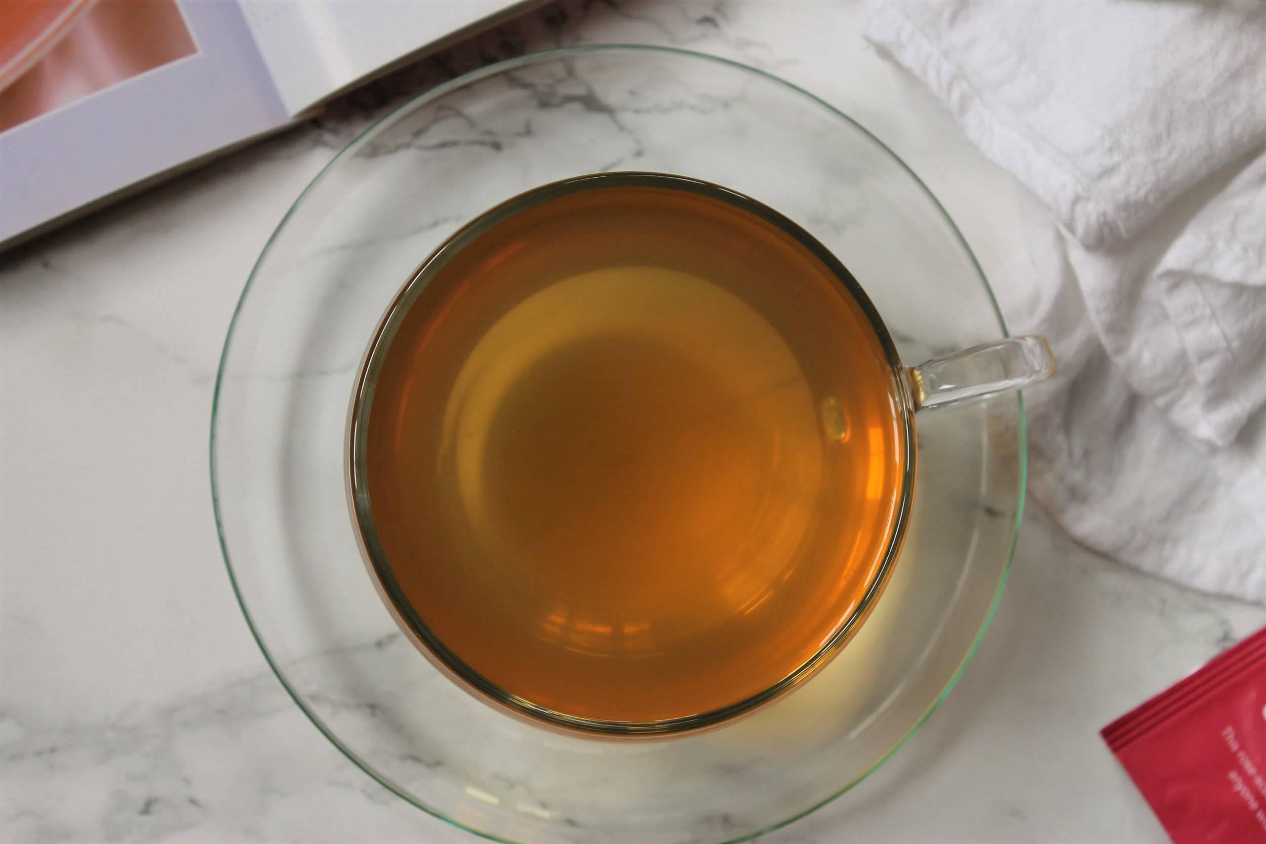 white tea in glass teacup