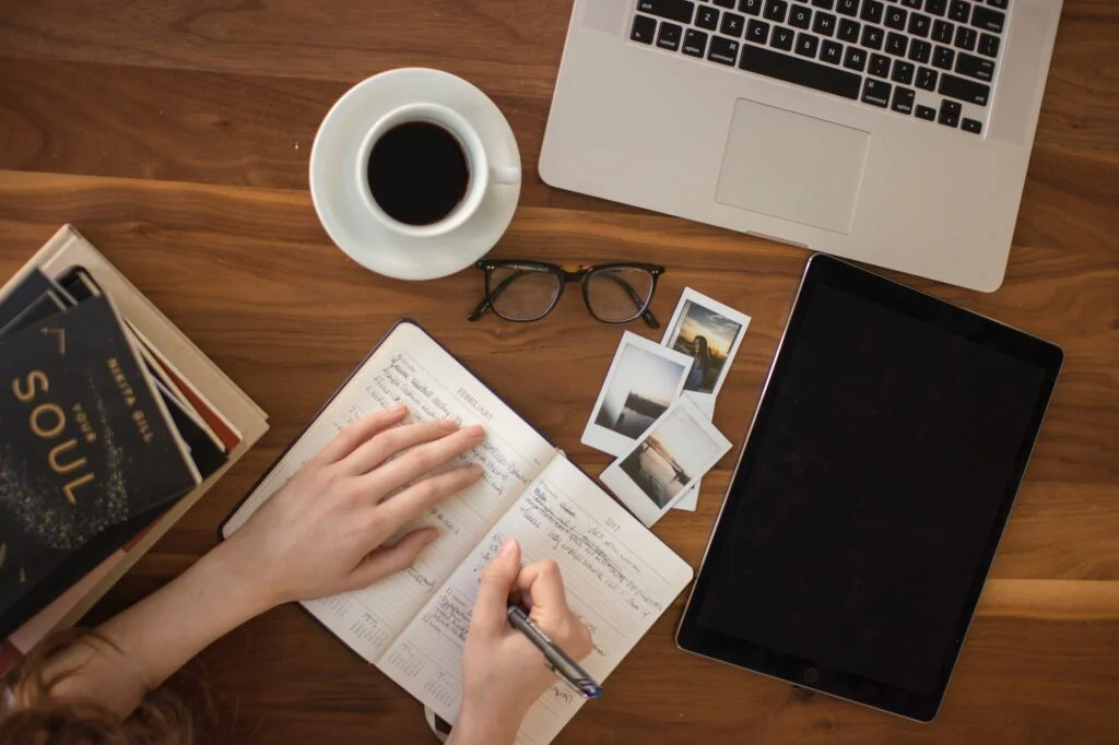 writing feedback notes in a journal
