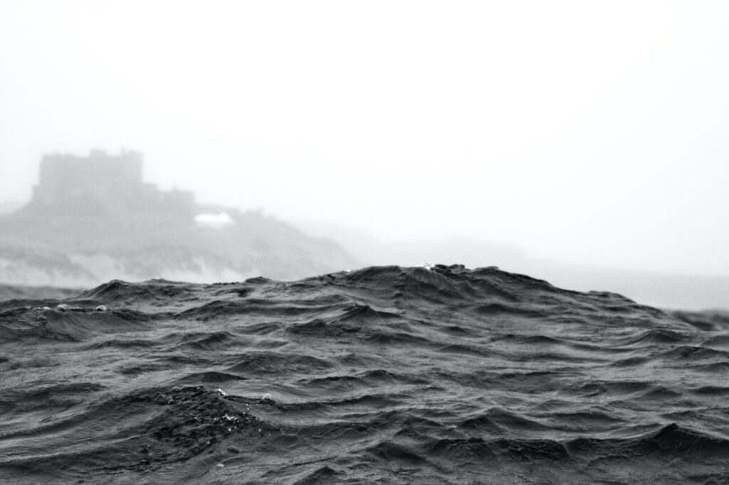 view of bamburgh from farne island