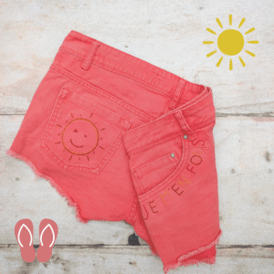 hot coral shorts embroidered with winking sun