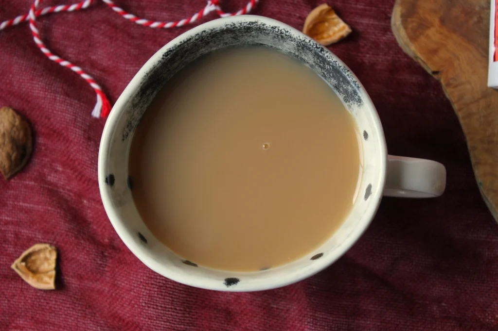cup of masala chai with milk