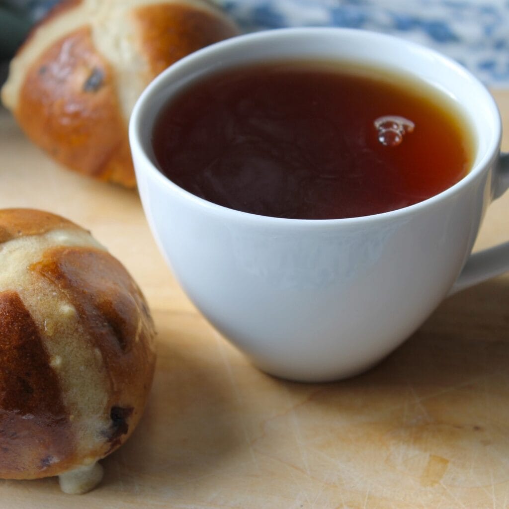 cup of tea and a hot cross bun