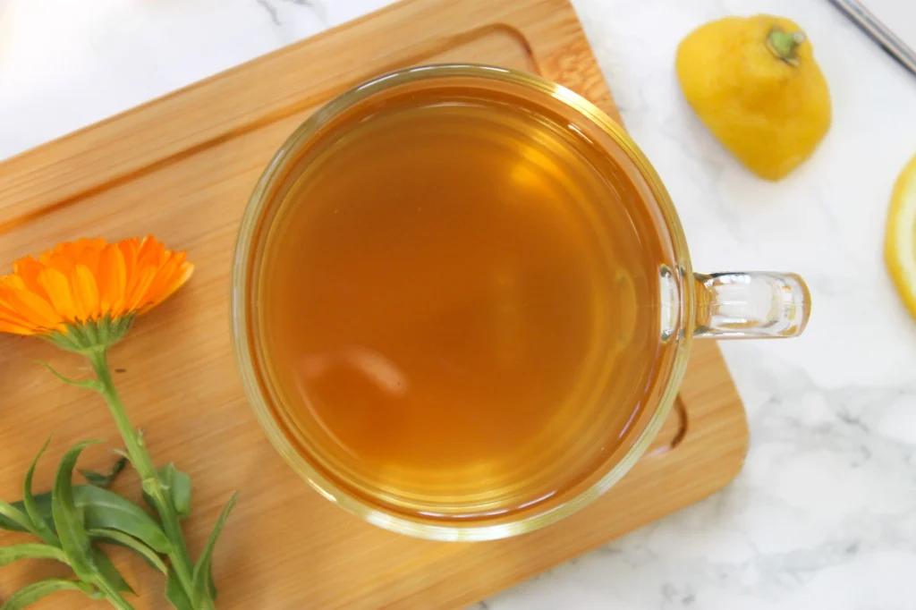 cup of two spoons tea lemongrass ginger