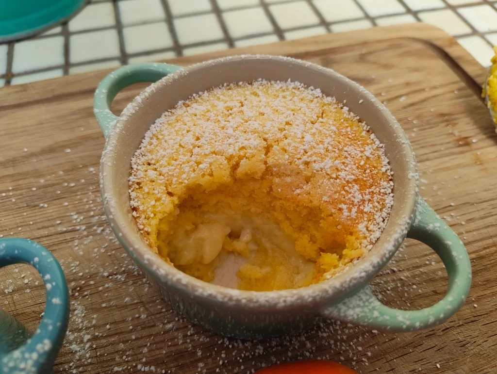 half eaten orange custard pudding