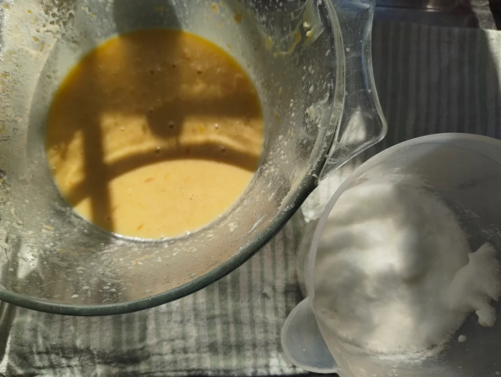 orange pudding batter and egg whites
