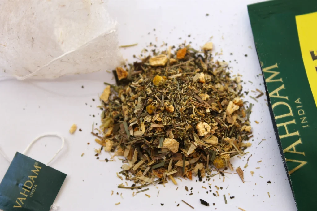 green tea with chamomile flowers and mint leaves